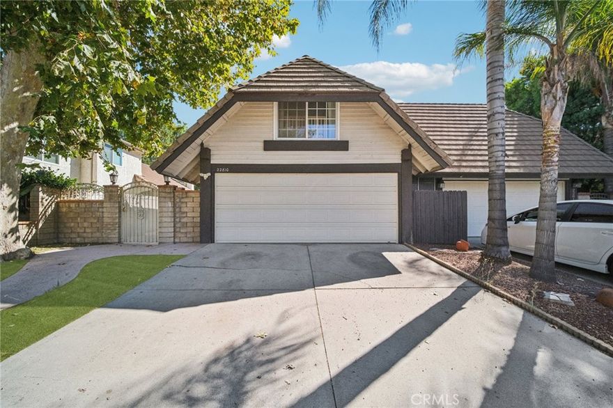 Welcome to 22810 Rio Chico Drive, a spacious and well-maintained home offering comfort, updates, and style in a desirable Santa Clarita neighborhood. This 3-bedroom, 2-bath residence spans approximately 2,032 square feet and features an inviting open layout designed for everyday living and entertaining.
The main level showcases vaulted ceilings, rich wood flooring, and a brick fireplace that adds warmth to the expansive living area. The updated kitchen includes granite countertops, stainless steel appliances, and custom cabinetry, flowing seamlessly into the dining space and out to the covered patio. Upstairs, a generous bonus room provides flexible space for an office, media room, or guest area.
Recent upgrades add peace of mind and energy efficiency, including recessed lighting installed in 2022, a new electrical panel installed in 2022, and a new HVAC system installed in 2024.
Outdoor living is made easy with a large covered patio featuring ceiling fans and low-maintenance landscaping, perfect for relaxing or entertaining.
Conveniently located near parks, schools, and shopping, this move-in-ready home combines functionality and comfort in one great package.