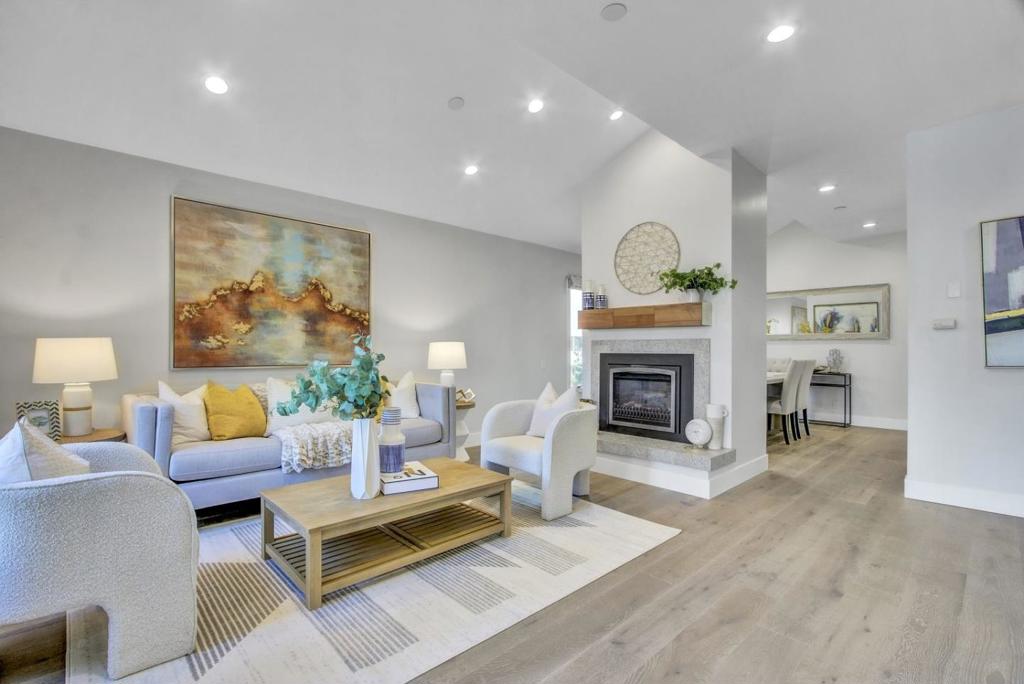New Price! Situated in the upscale and highly sought-after Palo Alto neighborhood just minutes to downtown. Experience this stylish and contemporary 2BDRM/2.5BTH desirable Townhouse with over 1600SF of living space providing a harmonious blend of luxury & functionality. The open layout features vaulted-ceilings, warm and inviting sunlit living area w/ a fireplace. Delight in the formal dining room seamlessly connected to the tastefully updated kitchen w/ SS appliances & a spacious kitchen nook w/ laundry area. Step out to a private and rare expansive patio area perfect for outdoor living. Upper level with primary suite, and updated spa like bath & walk in closet. The spacious guest bedroom is equally inviting, and the updated full baths add a touch of modern luxury to the space. Convenience of one designated parking spot in the gated garage w/ additional on-site parking adds to the allure of this home. This property offers ample outdoor living perfect for relaxation & entertaining. Ideal location, steps to University Ave. shops & restaurants. Minutes to Rinconada Park, Stanford, highly acclaimed PA schools, HWY 280/101, Cal Train & more!