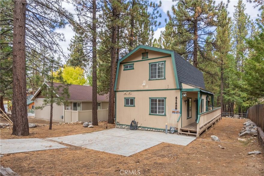 Experience mountain living at its finest with this charming 3-bedroom, 2-bathroom home located at 41438 Oak Street, Big Bear Lake. Encompassing 1,080 square feet of thoughtfully designed space, this residence offers an inviting atmosphere for relaxation and entertainment. Step inside to discover a modern interior that seamlessly blends comfort with style. The open-concept living area is great for gatherings, leading to a well-appointed kitchen equipped with essential appliances. Each bedroom offers a cozy retreat, while the bathrooms are designed with contemporary finishes. Set on a generous 6,325 square foot level lot, the property boasts a large deck, great for outdoor dining or simply soaking in the serene surroundings. Enjoy the quintessential California lifestyle with amenities such as a personal hot tub and an in-unit washer/dryer for added convenience. Parking is included, ensuring ease of access for residents and guests alike. The home's prime location places you near the vibrant shops, quaint village, scenic lake, exhilarating slopes, and delightful restaurants, offering both adventure and tranquility. Whether you’re unwinding in the spa or exploring nearby attractions, this Big Bear Lake gem provides the perfect balance of modern living and natural beauty. Explore this unique opportunity to experience the best of Big Bear Lake today.