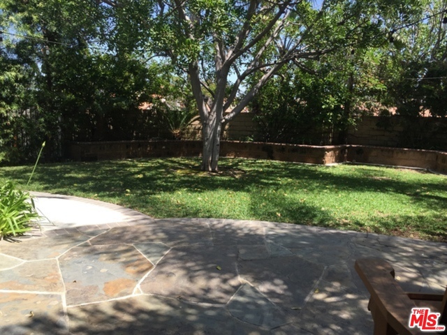 New Carpet and Paint, Granite Counters, Traverntine Tiles with Huge Private Back Yard.