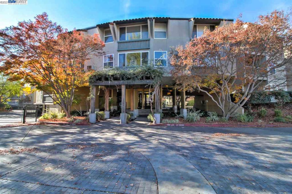 A premium, first floor Condominium featuring; beautiful stone tile floors throughout the living room, dining room, and kitchen. New carpeting in both bedrooms and a freshly painted interior. Cozy and comfortable and Move-in Ready, with a spacious kitchen granite counter-tops and stainless-steel appliances. This unit has a great flow with an open living room and dining area, two full bathrooms with granite vanity tops, and a private patio. Community amenities include; gated access, pool, spa, fitness gym, club house, laundry room and BBQ area. Perfect home for First-Time Home Buyers, Business Commuters, and Move-Down Retirees! Convenient to Hwy 84 and I-580 for commuters, as well as just minutes to either the Livermore or Pleasanton ACE Stations. Within a short walk or bike ride to the vibrant and historical downtown Livermore and Local wineries, this is your NEW Home!