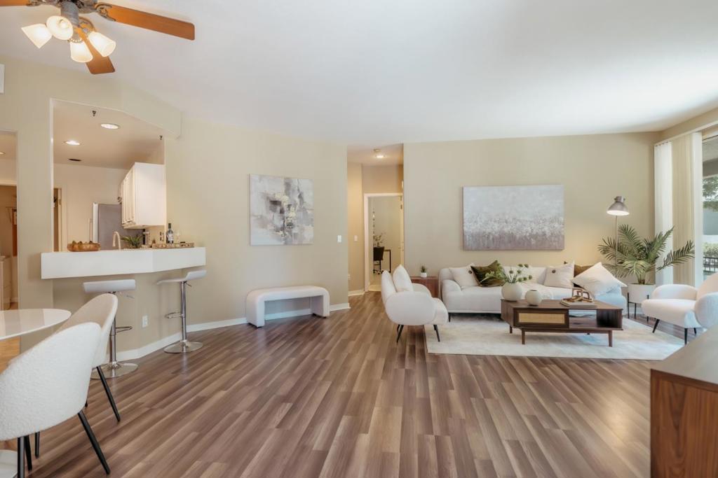 Centrally located near all the amenities Downtown San Jose and Japantown are well known for, this incredibly spacious and well maintained 2 bedroom and 2 bath condo features the exceptional flow of an open floor plan awash in natural light. With high ceilings, freshly painted walls and high end laminate flooring, and brand new stainless appliances, this home has the executive feel to match the stylish location of the Vendome neighborhood. Updated bathrooms, including a huge master with walk-in closet, and a spacious private patio make this unit feel almost like a single family home, complimented further by the full laundry room and attached 1-car garage. In addition to the beautiful interior this home also sits within the San Pedro Square community with a glimmering swimming pool and mature, well maintained grounds! The central location is near Japantown known for Sushi and trendy shopping/dining options, as well as near downtown SJ where many tech companies, and other amazing employment opportunities abound (legal, tech, government). Other neighborhood amenities include Whole Foods, Trader Joe's, the SJC airport, a full spectrum of dining and entertainment options, the San Jose Sharks, San Pedro Square with a weekly farmer's market and so much more!