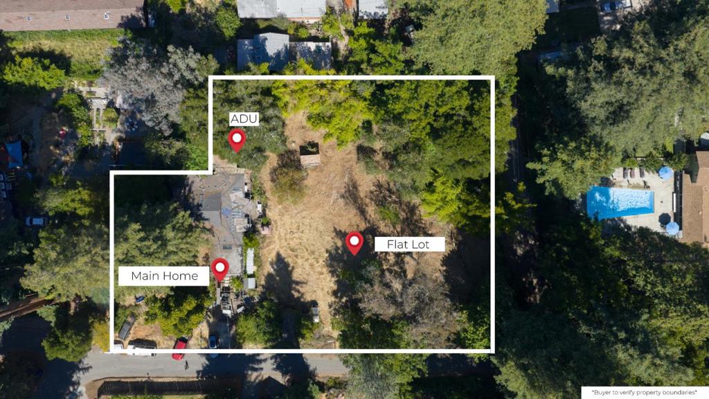 Are you looking for privacy while you can walk to downtown Boulder Creek? This flat and buildable lot that is shy of an acre is the perfect opportunity to transform the land to your creative vision. Tucked away on a peaceful street, the main home has 3 bedrooms and 2 bathrooms, including a cozy loft space and a massive 12'x40' kitchen overlooking the flat, usable yard; ideal for indoor/outdoor living, gardening, entertaining, or soaking in the redwood-draped setting. With strong structural integrity, this home is the perfect canvas for your artistic imagination. The detached studio ADU with loft expands your options with flexible space for guests, rental income, or creative use. Thoughtfully set among the trees, the property offers both privacy and low-maintenance ease; sunny and open, yet framed by majestic redwoods that deliver the mountain charm without the hassle. A short walk to Wild Roots Market, Redwood Resort, and short driving distance to Big Basin. Enjoy small-town warmth, friendly neighbors, and proximity to both Santa Cruz and Silicon Valley through Highway 9. Don't miss this opportunity to create something special in one of the most beloved corners of the San Lorenzo Valley. This is your chance to find a community and a lifestyle worth slowing down for.