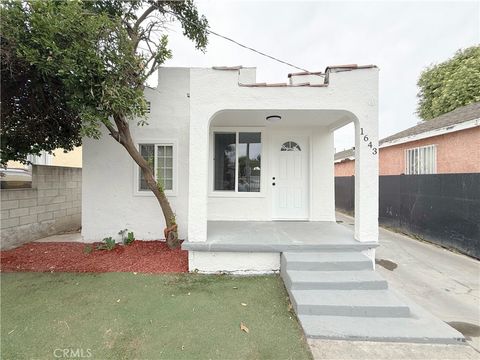 Photo of 1643 E 115th Street, Los Angeles, CA 90059 (MLS # IG26076287)