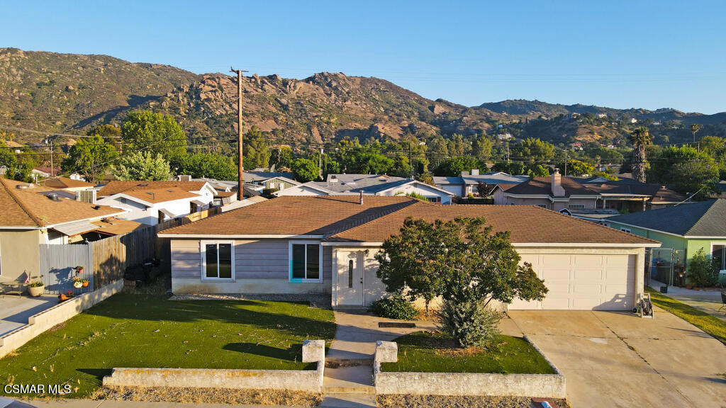 Perfect for investors and first time buyers, this blank canvas is located in a peaceful East Simi Valley neighborhood. This single story 3 bedroom, 2 bath has an open layout between the living room and kitchen/informal dining, encouraging easy living and a spacious feel. An ensuite primary bedroom with two closets is great for storage and privacy. The two secondary bedrooms have access to a large hall bath with a skylight, bringing natural light. Many of the windows have been updated, a big difference in efficiency and quietness. The good sized yard is fenced with two sheds and a covered patio. There is a two car garage and driveway parking.