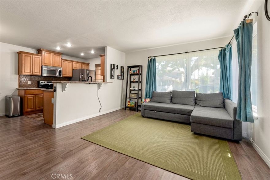 Welcome to 1325 Peppertree Circle, a rare single-story, end-unit condo located in the highly desirable Woodside Townhomes of West Covina. This charming 2-bedroom, 2-bathroom home with 870 sq. ft. of living space offers the perfect combination of comfort, convenience, and community.



Step inside to find a bright and inviting layout with laminate flooring throughout, central heat and air, and inside laundry for everyday ease. The spacious living and dining areas flow seamlessly, while the well-designed kitchen makes meal prep simple. Both bedrooms are generously sized, and the private, enclosed patio provides the perfect retreat for morning coffee, entertaining, or creating a pet-friendly space.



The community offers resort-style amenities including a sparkling pool and spa, basketball court, and beautifully maintained park areas. Whether you’re relaxing at home or enjoying the neighborhood, this property is designed for an active and low-maintenance lifestyle.



Ideally situated, you’ll be just minutes from shopping centers, the local golf course, the West Covina Sports Complex, and major freeways, making commuting and recreation a breeze.



This home is an excellent opportunity for first-time buyers, downsizers, or investors looking for a move-in ready property in one of West Covina’s most established and well-kept communities.



Don’t miss your chance to own this charming Peppertree Circle gem—schedule a showing today!
