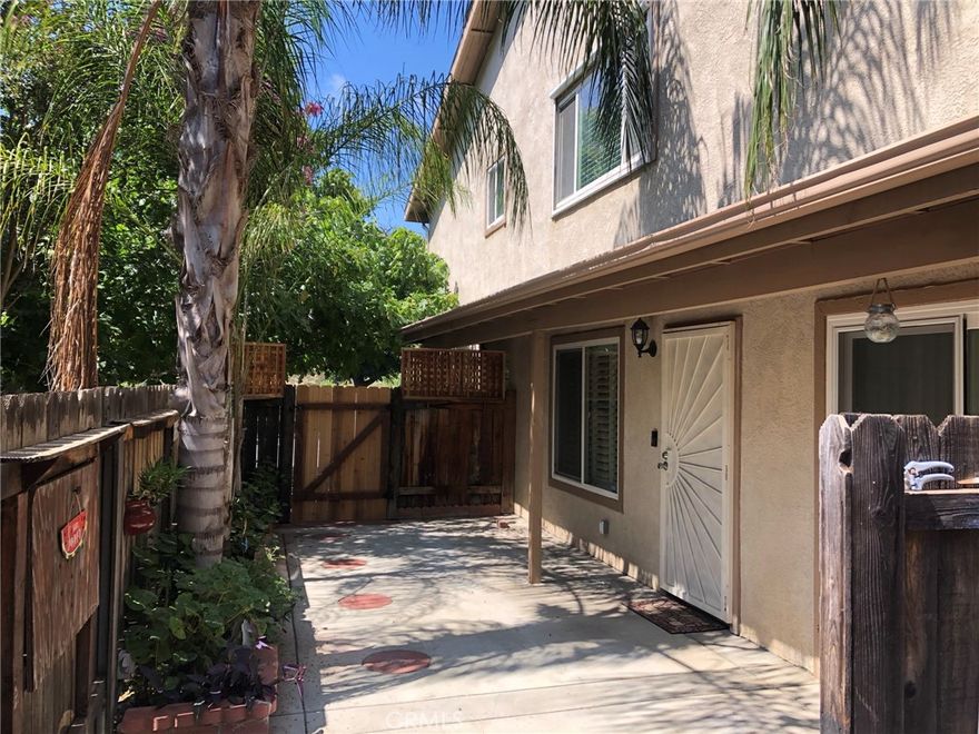 2 Bedrooms / 1.5 Bath, Two Story Condo in the Murrieta Villas Condo Association. Interior remodel features; Newer painted interior. Open floorplan with Living / Dining Area Great room with Wet Bar ~ Upgraded Wood Laminate Flooring ~ Plantation Shutters.  Galley Kitchen with lots of Counter / Cabinet Space ~ New Electric Stove/Oven ~ Built-In Microwave ~ Refrigerator ~ Washer/Dryer ~ New Laminate Countertops & Sink with Disposal.  Downstairs 1/2 Bath Powder Room.  Upstairs Features; Large Primary Bedroom Bedroom includes a large Walk-in Closet ~ Lighted Ceiling Fan ~ Window Blinds.  Spacious Guest Bedroom with Wardrobe Closet ~ Window Blinds ~ Lighted Ceiling Fan.  Upstairs Hallway Bath with Tiled Floors ~ Shower in Tub ~ Single Sink Vanity.  Downstairs patio with Privacy fence and gated entry.  One car space SHARED garage with storage cabinets and additional exterior storage closet. Close to schools, parks, shopping, restaurants, wine country, freeway access.  Rent includes Water, Trash & Common Grounds Maintenance.