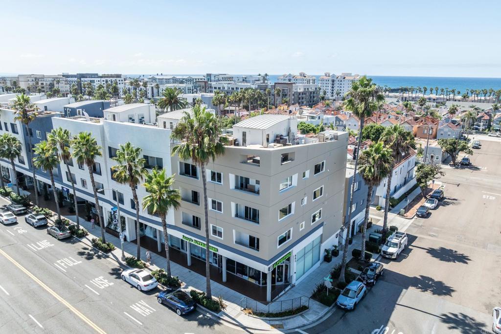 Welcome! Enjoy living a vibrant coastal lifestyle, where you can walk to the beach and choose to dine from casual to fine dining restaurant and cafes. Located in the heart of downtown Oceanside, the Historic Coast Hwy. 101. This stunning corner unit has panoramic ocean views and private separate access to its very own roof top deck! This home is the only one with four bedrooms in the entire complex. Also, this end unit is one of only two with this large square footage. With three stories of living space, the main floor has one bedroom and full bath, and a living room with balcony, fireplace, and wet bar. The kitchen has a large counter island that can accommodate more chairs, all white cabinets, stainless steel appliances, and contemporary style throughout. Most rooms have ocean views, where large windows fill the space with southern California sunshine. The second floor has two suite bedrooms, each with each own beautiful bathroom. The remaining bedroom has a balcony. The third floor offers a private office space with ocean views. Relax and enjoy the gorgeous sunset either the main floor, second floor, or roof top deck. Amenities include secured underground parking with two assigned, side-by-side parking spots in a gated garage, a storage locker, a bike lock-up station, two lobbies, and sauna with shower station Walk down and take a short stroll to the beach, Oceanside Pier, bike trail, train, gym, library, theaters, farmers market where there's a live music, museum and cafes. Occasionally there are concerts by the beach. A very short drive or even walk by the Marina where you can watch sail boats coming in and out. Many shops and restaurant around the area.