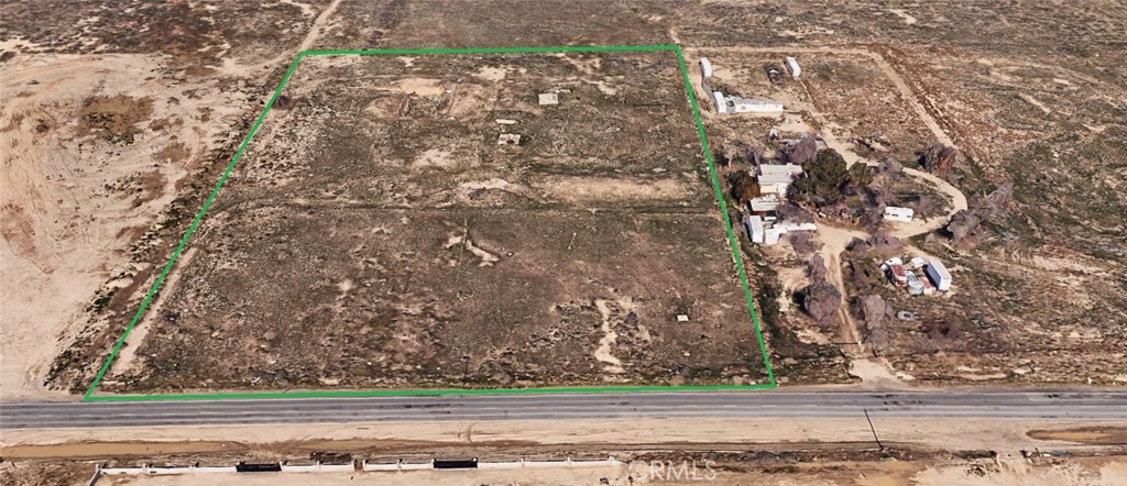 6+- acres of M-1 light industrial zoned land with paved road frontage and electricity in the front of the property. This lot features 420 feet of road frontage on E Avenue H.