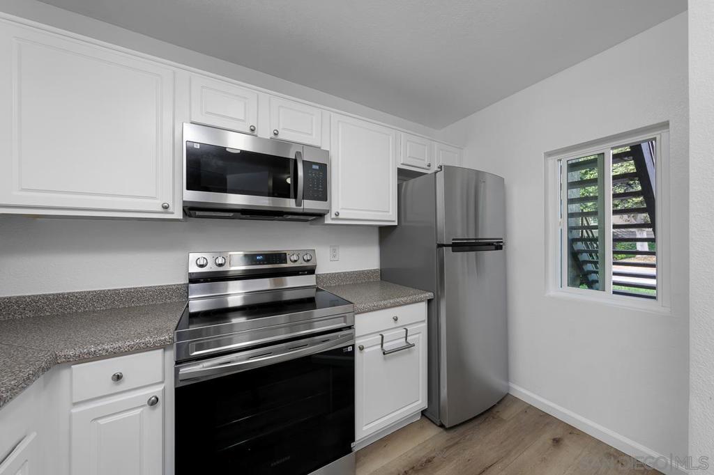 PRICED TO SELL! New complete paint, refurbished Bathtubs, new appliances, move-in ready. first floor.