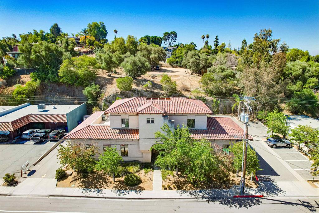 Exceptional Mixed-Use Commercial Property in Fallbrook’s Revitalizing Downtown. An outstanding opportunity awaits with this 4,362 square foot Mediterranean-style building, located in the heart of Fallbrook’s revitalizing downtown core. Set on a 0.45-acre lot with FBV3 zoning, this property offers flexibility for various commercial or professional uses. Built in 1992 and meticulously maintained, it features two second-floor office suites, ideal for a range of business operations. The ground floor is home to two retail spaces, providing excellent street visibility. One space is currently leased to a dental tenant, delivering immediate income potential, while the other features a rare drive-through window—perfect for a coffee shop, quick-service restaurant, or boutique retailer. This retail space is currently vacant, presenting an excellent opportunity for an owner-user or a new tenant. Key highlights of the property include: 15 dedicated parking spaces, prime location just steps from Main Avenue with strong visibility and easy access, surrounded by a growing mix of retail, dining, and residential developments Positioned within one of North County San Diego’s most promising growth areas, this property offers immense potential. Whether you're an investor seeking a value-add opportunity or an owner-user looking for a strategically located space, this property provides a rare combination of location, design, and upside potential.