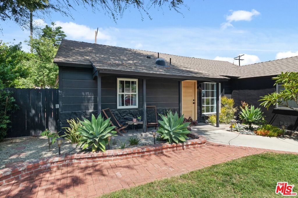 Fall in love with this captivating remodeled 2 bedroom + 2 bath + detached studio remodeled home in one of LA 's favorite neighborhoods! As you walk in, you'll be greeting be the sun-drenched dining area that flows seamlessly into the cozy living room with a wall of glass windows overlooking the backyard framed by the entertainer's backyard. Skylights bathe the gorgeous, remodeled kitchen and bathrooms in natural light. Gleaming new oak hardwood floors throughout warm the space. French doors leading to the expansive lush backyard with patio, a soaking pool (filtered!) and detached studio (yoga, art studio), complete with delicious mature orange tree, prefect for enjoying the summer weather! The garage space just off the kitchen a versatile bonus room awaits, prefect for a home office, studio or work out room whatever fits your lifestyle needs and includes new washer / dryer. Each bedroom offers comfort and privacy including a bedroom with its own remodeled en-suite bathroom. Located on a quiet tree lined street where a sense of community welcomes you! Lake Balboa is known for its verdant green 80-acre park with sparkling 26-acre lake. Walk the path around the lake, rent swan paddle boats, picnic on the meadows or go fishing! Enjoy the fun playground, wide open meadows of lush grass, golf courses, the Sepulveda Basin Wildlife Reserve, a Japanese garden, velodrome, and a sports complex. You can also take your pooch to the Sepulveda Dam off-leash dog park. Or ride a short distance to the 18-mile Orange Line Bike Path. Closer to home, Louise Park features barbecue pits, a lighted baseball diamond, outdoor basketball courts, a children's play area, and picnic tables or enjoy the local cafes. Trader Joe's is a 10-minute drive. You will want to call this home!