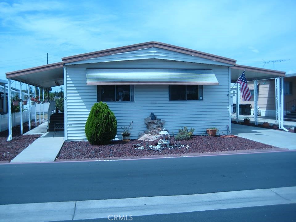 Spacious Manufactured Home with Large Lot in Gated Community
Located in the desirable Rancho La Paz Mobile Home Park, this 2-bedroom, 2-bathroom home offers a wonderful opportunity to own in a gated, all-age community. The park spans both Anaheim and Fullerton, and this home is ideally situated on the Fullerton side.
Set on a very large lot, the property offers plenty of space and potential for future improvements. The home features a spacious living room with open dining area, a large kitchen, and covered parking for two cars. Outdoors, enjoy a private patio, two storage sheds, an outdoor freezer, a large lemon tree, and plenty of room to garden or expand. The lot may allow for adding extra rooms or even a closed-in garage.
Home Features:
Bright, open-concept layout filled with natural light
Upgraded waterproof laminate flooring & sub-flooring (professionally replaced 2 years ago)
Entire home re-piped with PEX plumbing (1 year ago)
Custom window blinds with insulating shades in the living room & kitchen for energy efficiency
Brand new water heater (installed less than a year ago)
Foundation equipped with earthquake braced piers for stability
Refrigerator, stove, washer & dryer included
Indoor laundry for added convenience
With a little TLC, this home can truly shine and reflect your style.
Community & Location Perks:
Gated all-age park with pool, hot tub, and community clubhouse with stage & game tables
Pet-friendly community—welcoming for families and pets
Conveniently located near Downtown Fullerton, Disneyland, Honda Center & Angel Stadium
Close to restaurants, shopping, seasonal festivities, and entertainment
Easy access to major freeways for commuting
Why rent when you can own? With a large lot, valuable upgrades already completed, and room to personalize, this home is a fantastic alternative to condos or apartments at an affordable price.
Schedule your showing today!