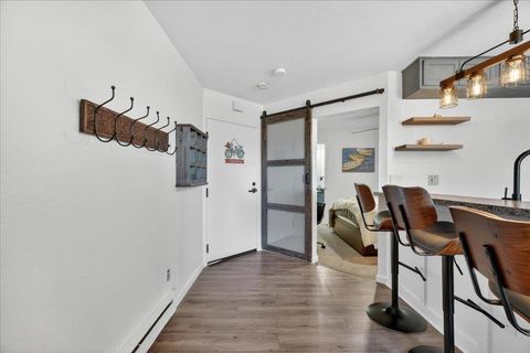 Photo of 125 Surf Way #305, Monterey, CA 93940 (MLS # ML82048892)