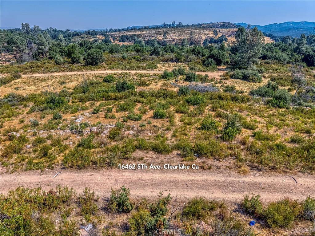 Two adjoining hillside lots totaling 0.22 acres, zoned Rural Residential (RR). With no utilities available, this property is ideal for off-grid living, a small getaway, or future investment. This property is situated on a quiet road in a rural setting. Only a 5-min Drive to get to Walmart or Starbucks, a 6-min drive to the Hospital and the Anderson Marsh State Park and 10-min to get to the lake at Redbud Park.