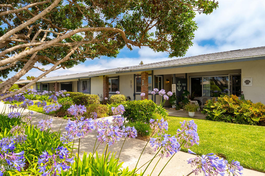 Welcome to 130 East Bay Boulevard-a beautifully updated two-bedroom, one bath home with a bonus large hobby room attached to the single car garage. This move-in ready home was designed for comfort and ease of living. Perfectly situated with convenient front-street and garage parking, this home blends style with practicality./the modern kitchen features stainless steel appliances, a custom pot-filler above the stove, elegant glass tile backsplash and granite countertops-ideal for effortless cooking and entertaining. The spa-inspired bathroom offers a travertine vessel sink and granite vanity for a touch of everyday luxury. Throughout the home, you will find durable porcelain ceramic tile flooring and ceiling fans in the bedrooms, kitchen, and hobby room-creating a cool and relaxing environment year round. Whether you're looking to downsize or enjoy low-maintenance living in a welcoming neighborhood, this home is ready for you.