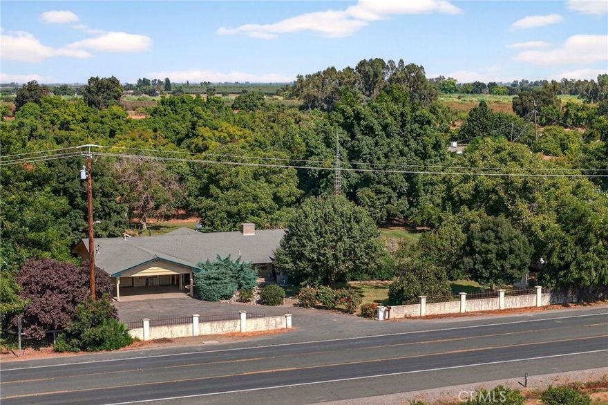 Great Orland Location! Conveniently situated just off Hwy 32, this property offers an easy commute to Chico or into the heart of Orland. Sitting on approximately 1.5 acres, the setting is peaceful and spacious with beautiful mature trees providing shade and charm. The home features 3 bedrooms and 3 bathrooms, a large living room with a built-in bar—perfect for entertaining—and an indoor laundry room for added convenience. There’s also a separate room currently set up as a working hair salon with its own private entrance and bathroom, offering an incredible opportunity for a home business or guest suite. A nice work shed provides additional storage. This is a wonderful property full of potential in a desirable Orland location!