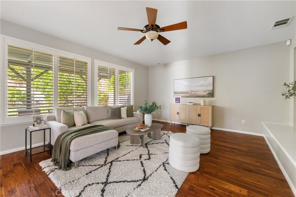 Welcome to this beautifully maintained 6-bedroom, 4.5-bathroom home tucked away in a quiet cul-de-sac in one of Santa Clarita’s most desirable neighborhoods. Designed with both comfort and functionality in mind, this spacious home features hardwood floors, tile, and elegant shutters throughout the first level. The main floor includes a full bedroom and bathroom — perfect for guests or a Mother in law suite! — plus a convenient half bath for visitors. Upstairs, you'll find four generously sized bedrooms connected by Jack and Jill bathrooms, a loft, and a dedicated laundry room. The luxurious primary suite offers a retreat-like experience with a massive en-suite bathroom and dual walk-in closets.
Additional highlights include a 3-car garage including a Tesla charger, tankless water heater, and a whole house fan. The backyard is a true oasis, featuring a lush garden with an impressive variety of fruit trees and vines — including figs, apples, lemons, blackberries, strawberries, and grapes.
Located within a top-rated school district, this home offers a perfect setting for family living in a safe, vibrant community. NO MELLO-ROOS! A rare gem — come see it for yourself!