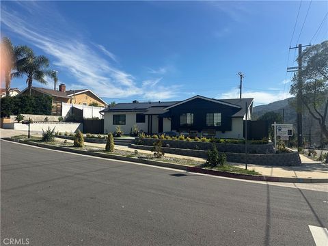 Photo of 9500 Mina Rica Dr, Tujunga, CA 91042 (MLS # BB26048391)