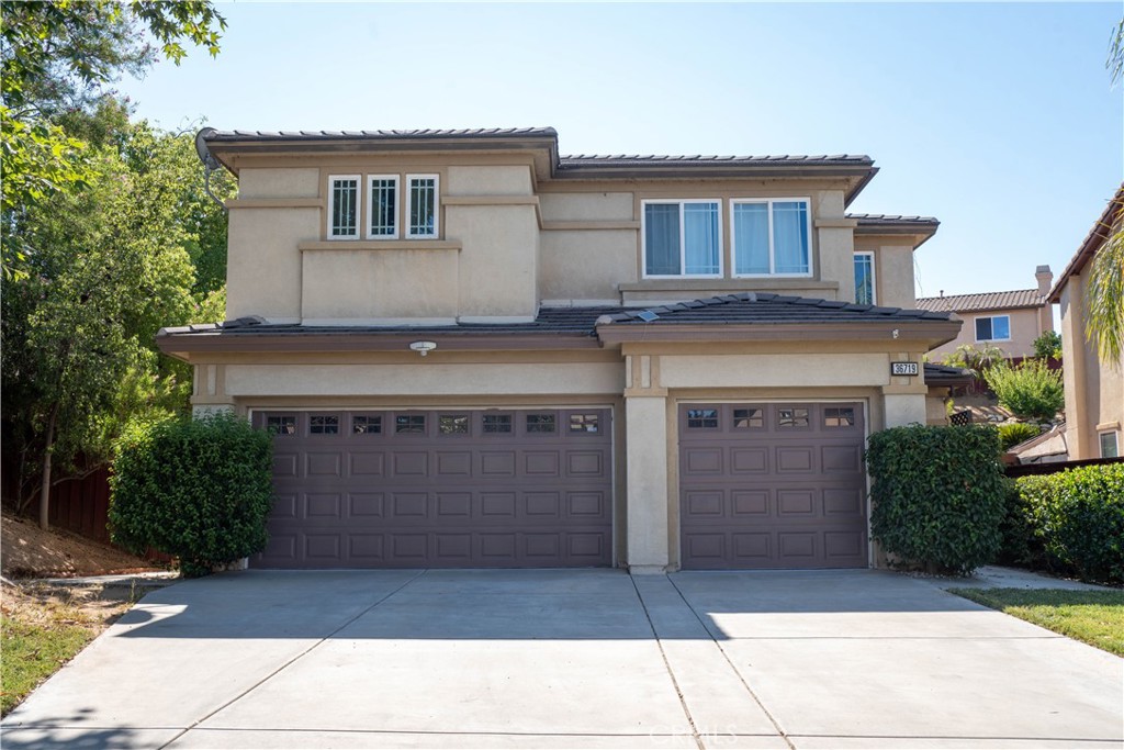 Located in the highly desirable gated community of Tournament Hills, this stunning two-story home offers 3 bedrooms, 2.5 bathrooms, a spacious loft and a dedicated office that can easily serve as a 4th bedroom. Step inside to a bright and open layout featuring soaring cathedral ceilings that welcome you into the formal living room. The kitchen boasts granite countertops, a center island, pantry, and an open design perfect for entertaining. Upstairs, the expansive primary suite includes a large walk-in closet with built-in cabinets and a private bathroom with dual sinks, a jetted soaking tub, and a separate shower. The addition loft provides even more space for relaxation, work, or play. The backyard is designed for gathering, complete with a gazebo, built-in grill, and a covered concrete patio. The property also includes a 3 car garage, a huge lot, and an extended driveway offering plenty of parking. Tournament Hills offers resort-style amenities including walking paths, a private lake with picnic areas, and 24-hour security. Conveniently located near Tournament Hills Elementary School, This community is ideal for families seeking comfort and peace of mind.