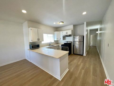 Photo of 3421 Walton Avenue, Los Angeles, CA 90007 (MLS # 26634031)
