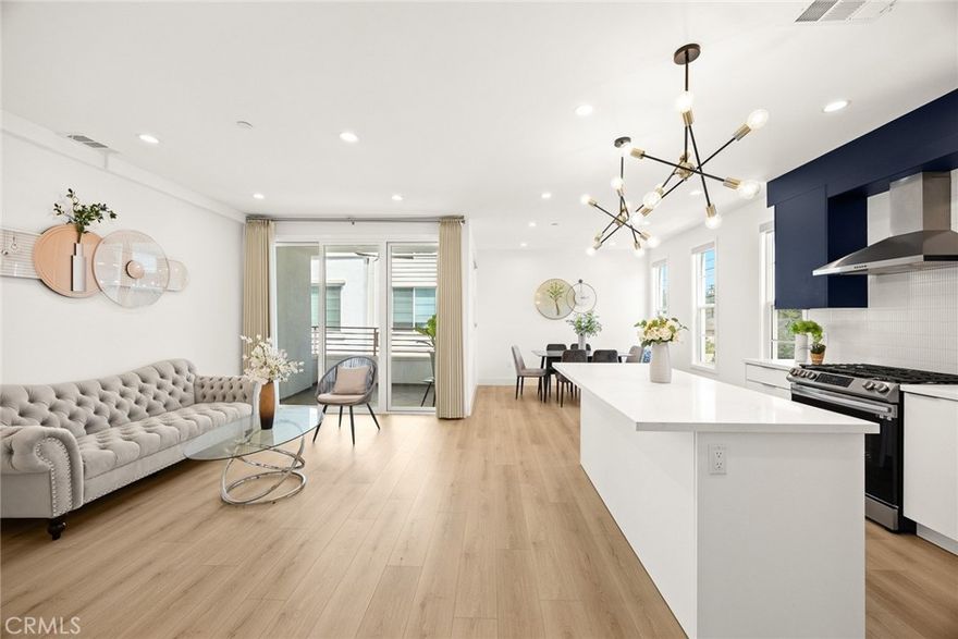 Nestled on a serene street in one of San Gabriel’s most sought-after neighborhoods, this brand new 2024 townhome offers 1,556 square feet of contemporary elegance, an ideal choice for young couples, investors, and working professionals.



The main floor welcomes you with a bright open-concept layout designed for both comfort and connection—perfect for everyday living and entertaining. The stunning kitchen boasts elegant countertops, sleek cabinetry, and a generous center island, complemented by a dedicated dining area. Step outside to your own balcony, an ideal setting for relaxing moments and sunny afternoons. A well-appointed full bathroom on this level adds thoughtful convenience.



Upstairs, the primary suite awaits—a true sanctuary with high ceilings, a walk-in closet, and a private bathroom. A second bedroom suite offers equal comfort and privacy, complete with its own bath—perfect for family or guests.



The private rooftop deck invites you to enjoy morning coffee or host sunset gatherings under the stars.



Additional highlights include beautiful wood flooring and recessed lighting throughout, ample storage options, and direct access to an attached two-car garage.



Ideally situated near award-winning schools, diverse dining, cultural attractions, and major freeways, this home ensures effortless connections to Pasadena, Alhambra, and Downtown LA. 



Move-in-ready and meticulously crafted, this townhome offers an unparalleled blend of modern luxury, income potential, and prime location—perfect for first-time homebuyers, savvy investors, and busy professionals alike.