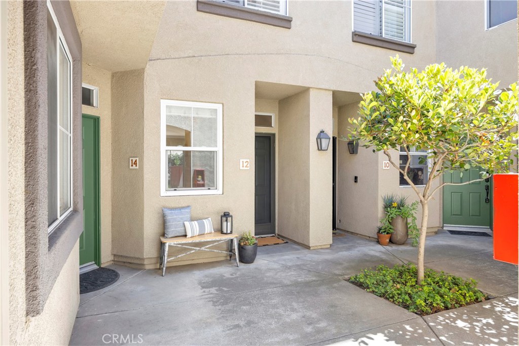 Welcome to 12 Mesquite in the vibrant Dakotas community of Wagon Wheel. This charming condominium offers a modern yet cozy living experience. With 2 bedrooms that live like primary suites, each featuring private attached bathrooms, this home is perfect for those seeking a comfortable and stylish space. An added benefit is that this complex is free of Mello-Roos!
Step inside to find a freshly painted interior and new carpet on the stairway, enhancing the overall appeal. The living area boasts elegant tile floors and contemporary laminate flooring, all illuminated by recessed lighting. The kitchen seamlessly integrates into the living space, making it ideal for entertaining.
Upstairs, you'll find a convenient laundry area, adding to the functional design of the home. Parking is a breeze with a newly epoxied 1-car garage and assigned parking space.
Step out to your private outdoor patio space, surrounded by lush greenery—a perfect retreat for relaxation or entertaining. This pet-friendly community offers a blend of tranquility and modern amenities, including a communal pool and spa.
Conveniently located near the 241, you'll be surrounded by scenic biking and hiking trails, parks, and access to highly-rated schools. Discover the perfect balance of leisure and lifestyle at 12 Mesquite.