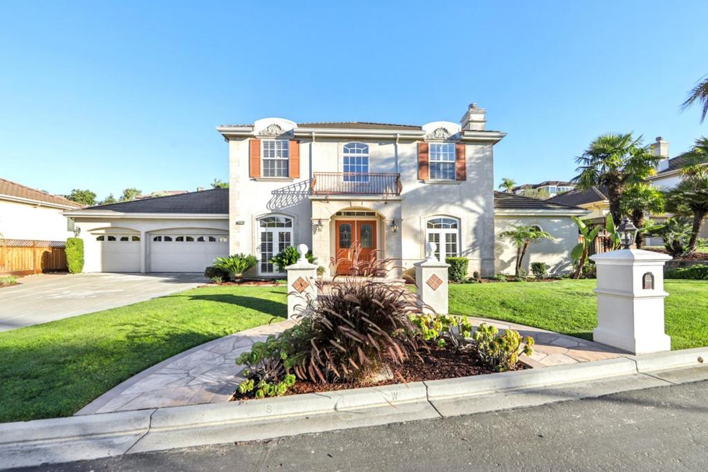 Welcome to this bright and spacious residence in the highly coveted Mansions Collection of Silver Creek Valley Country Club, designed with both elegance and functionality. The main level features an inviting formal living and dining room, along with an open-concept family room seamlessly connected to a generous bonus space which can be transformed into a private home theater or 5th ensuite bedroom for extended family or visiting guests. The chefs kitchen is a true centerpiece, showcasing a center island with prep sink, double ovens, and a walk-in pantry, offering ample space for culinary creations and effortless entertaining. The downstairs primary suite is a private retreat with direct backyard access, featuring a spacious bedroom and spa-inspired bath with jetted tub and dual showers. Upstairs, youll find three junior suites plus an enormous game room that can easily serve as a media lounge, recreation hub or home office. Elegant touches include hardwood and luxury laminate flooring and recessed lighting. The backyard is a serene oasis, offering two sitting areas for outdoor dining, entertaining, or simply unwinding in peace. Tucked away on a quiet street, this home offers a rare chance to enjoy the resort-like lifestyle and scenic beauty of Silver Creek Valley Country Club.