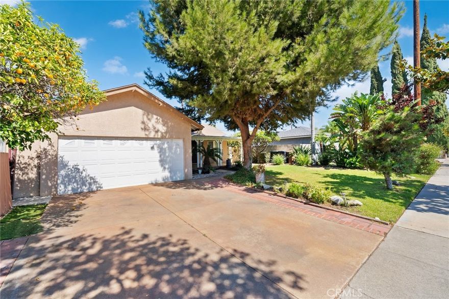 Welcome to this thoughtfully designed 3 bedroom, 2 bathroom, with bonus room / mother in law suite. Nestled in one of Fullerton's most peaceful and conveniently located neighborhoods. Throughout the home you will find hardwood flooring maintained in pristine condition. The main bathroom has been recently remodeled and upgraded with modern touches. The backyard is your own private garden with fruit trees, and carefully designed landscaping that makes it perfect for hosting friends and family or just enjoying a morning cup of coffee in your own private escape. The bonus room designed as a mother in law suite with its own kitchenette, that makes this home ideal for large families, or for hosting visitors. This one is a must see!