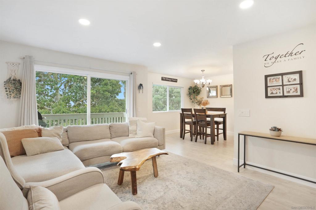 This "VA approved" beautifully remodeled 2 bedroom, 2 bath, with full laundry and walk-in closet in the en suite bedroom offers a unique layout. It combines style, comfort, and a family friendly atmosphere with convenience to the pool, green yard, and community club house. In one of Oceanside’s most central locations. Inside, you’ll find a bright and open floor-plan with updated finishes. The owners added a custom built in electric fireplace, that bring a lovely touch in the living space. Enjoy your own private balcony where you can BBQ and entertain dinners outside during the Summer, that opens to peaceful greenbelt views, no neighbors directly behind offering a rare sense of space and serenity. The below 1 car garage adds everyday ease, while the well-designed floor plan offers great space with a balcony overlooking the park.