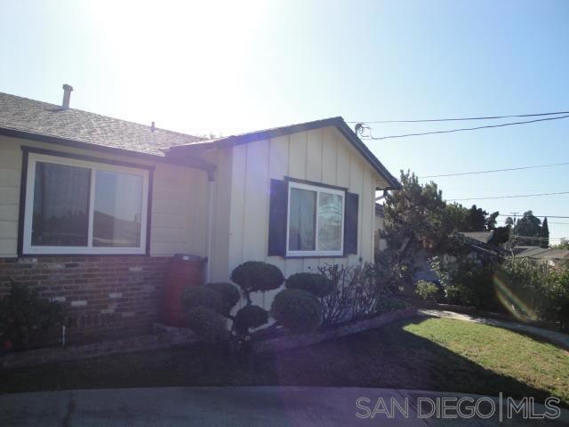 Featuring a jewel of Del Cerro! Large main bedroom with sliding door access to the tropical setting in the back yard, a unique functional Murphy bed in the 3rd bedroom, a large foyer with double doors at the entrance leading to a spacious living area with a fireplace, and adjacent is a second wood-burning fireplace located in the family room, with wood floors, The kitchen/ dining area has been remodeled featuring cherry wood cabinets and granite counter tops, a built in range with a warming oven, This area is tiled and has wood flooring as well. Tankless water heater for convenience, well-manicured yard with artificial turf in the fenced back yard
