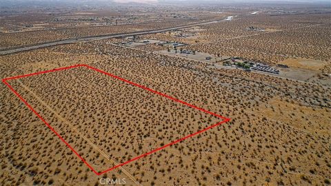 Photo of 0 -Dos Palmas Rd., Pinon Hills, CA 92372 (MLS # HD24225121)