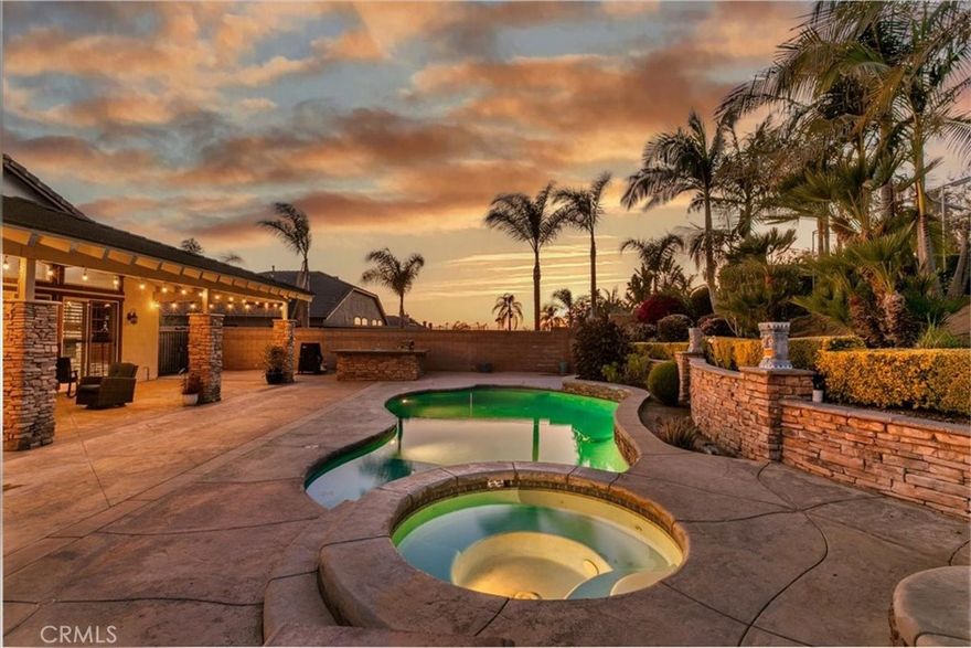 MAGNIFICENT Highly Sought After Norco Hills Single Story Home with RV PARKING, PAID OFF SOLAR, POOL & SPA . Spectacular home with elegant & high end upgrades that you will fall in love with. Beautiful curb appeal with lush landscaping. The Grand entry leads you to high 20 foot ceilings as you walk into this expansive home. This home features an office/bedroom with a Jack & Jill bathroom separated from the rest of the bedrooms. If you like to entertain you have an oversized formal dining room & an additional family room/pool table/gym area.  Love to cook? Kitchen has been completely renovated with high end CUSTOM FEATURES. The custom island has a built-in kitchen table and seating area that overlooks the family room area. GOURMET KITCHEN features SUB-ZERO built in refrigerator, beautiful custom cabinets INCLUDING OVER THE RANGE, built in microwave, dishwasher and 48 inch stainless steel Fulgor Milano range that includes 6 burners and a griddle with a double oven. The quartzite countertops and the custom tile backsplash add to the elegance of this home.  There are tons of cabinets with extra storage including a Walk-in Pantry . Seller has installed all newer engineered wood floors & beautiful travertine tile. The Primary bedroom has high ceilings, and a gas fireplace for ambiance and warmth. Oversized walk-in closet allows a lot of space for your wardrobe. The Primary bathroom has been completely remodeled & features dual sinks, custom quartzite countertops, large jetted tub. Sliding glass doors lead you to your oasis backyard to the view of pool and a nice breeze. There are plantation shutters through-out adding character & charm to this home. Indoor laundry room with custom cabinets and a sink. As you step outside you will fall in love in an instant. The breathtaking backyard has a gorgeous pool & spa that includes a Baja shelf perfect for soaking in. Beautiful stamped concrete all around that includes drains.  The large attached patio is approx. 20 feet tall and is a perfect place to entertain guests.  There is a built-in BBQ area making outdoor gatherings  a breeze. As you walk up the elegant staircase to the upper portion,  you will find the beautifully landscaped area large enough for many uses and animals. Located just minutes from the Hidden Valley Golf course, Pumpkin Rock Hiking trail & Ingalls Equestrian center. Paid off solar has 20 panels including a Tesla power pack, newer exterior paint. Plenty of RV Parking