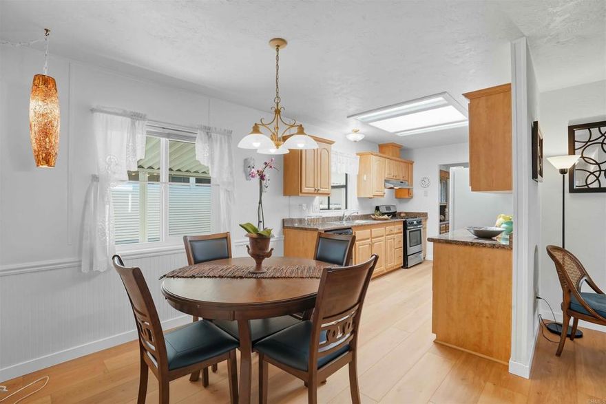 Beautiful Home in desirable 55+ gated Rancho Carlsbad Community.  Enjoy the comfort, convenience, and charm of this recently updated home.  New Luxury Vinyl Plank flooring just installed throughout!  Baths and Laundry room has complimentary tile flooring.  This move-in ready residence offers a serene lifestyle just minutes from the beach, shopping, and golf. Available partially furnished if desired. (one person must be over 55 years of age, the second person must be over 45 years of age).   Features You’ll Love: Modern Kitchen with ample cabinet space.  Spacious Layout (see floor plan on photo attachment) with natural light and an open, easy-to-navigate floor plan. Two Full Bathrooms, both thoughtfully updated with stylish fixtures. Full-Size Washer & Dryer included and conveniently located inside the home Large Open Living Room and dining area with built in china cabinetry.  Outdoor Highlights: Low Maintenance Yards. Large side patio space for morning coffee or evening relaxation  Community Amenities: 24-hour gated security. Clubhouse, pool, spa, walking trails, and fitness center. Active social calendar and friendly neighbors.  Close to Carlsbad Village, medical offices, restaurants, and I-5 access.  Come see why so many love calling Rancho Carlsbad home. This is the perfect place to relax, connect, and enjoy the best of coastal North County living.