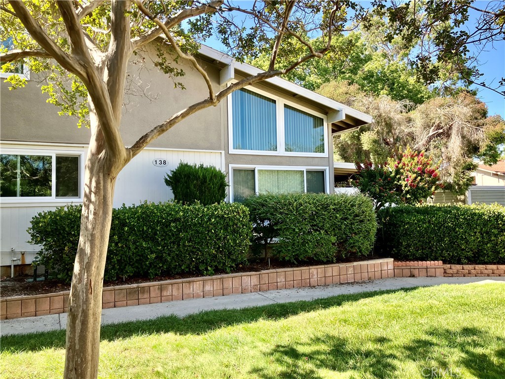 Bright and inviting 2-bedroom, 2-bath, two-story home featuring dual-pane windows and newer laminate flooring throughout. Enjoy the open, airy feel with plenty of natural light. Conveniently located near community laundry and just steps from your carport. Situated in a vibrant 55+ community offering endless activities, including golf, tennis, pickleball, billiards, card games, and so much more—perfect for staying active and social!