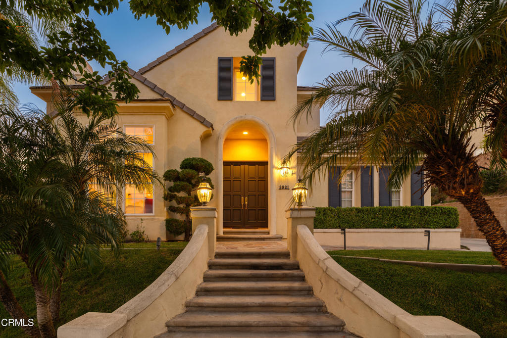 Welcome home to this gorgeous estate with sunset views located within the gated community of La Vina. The front door opens to a breathtaking vaulted foyer. The foyer leads into a beautiful living room with dramatic two-story ceilings and a separate office space or music room. Spacious hallways lead to a formal dining room and spacious family room. A private downstairs en-suite bedroom perfect for guests. The kitchen features a granite island and walk-in pantry. The kitchen opens up to a separate dining space with built-in cabinetry and a desk. Enjoy panoramic views from the second-story balcony off of the primary suite with en-suite bathroom and a bonus room for a nursery, gym, or second home office. Take advantage of the grand walk-in closet that provides ample space for clothing and storage. The backyard rounds out this gorgeous property with an enchanting patio! All the things we love about La Vina remain a cornerstone of this cherished community. It offers a gated environment with amenities like a playground, community pool, and serene walking paths that meander through meditative Oak tree groves. Although recent fires have impacted some of these areas, the community is committed to restoring them. La Vina, situated at the top of Altadena, remains a beautiful haven, just minutes away from Old Pasadena, the Rose Bowl, and only 15 miles from DTLA.