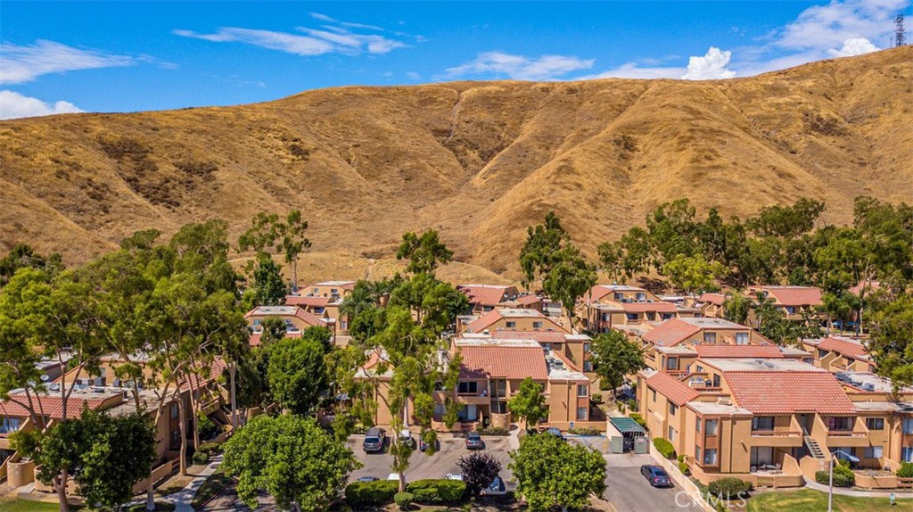Welcome to this gem in the gated community of San Bernardino! This freshly painted and newly carpeted condo features 2 bedrooms, 1 bathroom, and spans 904 sqft. Enjoy balcony views, front parking, and a 2-car garage, along with access to a refreshing community pool. Conveniently located near California State University of San Bernardino, it's close to restaurants, nightlife, grocery shops, and mountain trails. Ideal for those seeking a comfortable home in a vibrant neighborhood.