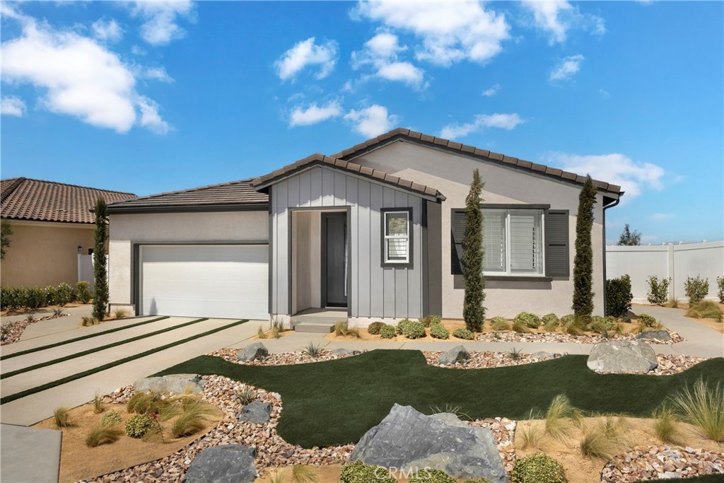 Pacific Lily Plan 5 – Ready for You to Move In Soon!
Welcome to your brand-new home at Pacific Lily. This beautifully designed single-story home offers 2,510 square feet of spacious living on a 7,470 square foot lot. With 4 bedrooms, 2 bathrooms, and a 2-car garage, this home is crafted for comfort, convenience, and modern family living.
The kitchen is the centerpiece of the home, featuring upgraded Oceana Quartz countertops with a full backsplash, white shaker-style cabinetry, and a suite of Samsung appliances including a range, microwave, and dishwasher. The open-concept layout flows easily into the dining and great room, offering a welcoming space for gatherings and everyday life.
Buyers will enjoy the opportunity to personalize their flooring selections, adding a custom touch to the home’s already elevated design. With construction nearing completion, this home will be ready to close escrow in approximately 45 days—don’t miss your chance to move in before it’s gone!
Plan 5 at Pacific Lily offers the perfect blend of thoughtful upgrades, spacious design, and the flexibility to make it your own. Schedule your private tour today and secure your new home in this sought-after community.
*Photos shown are of the Plan 5 model home and are for representation purposes only. Actual features, finishes, and layout may vary.