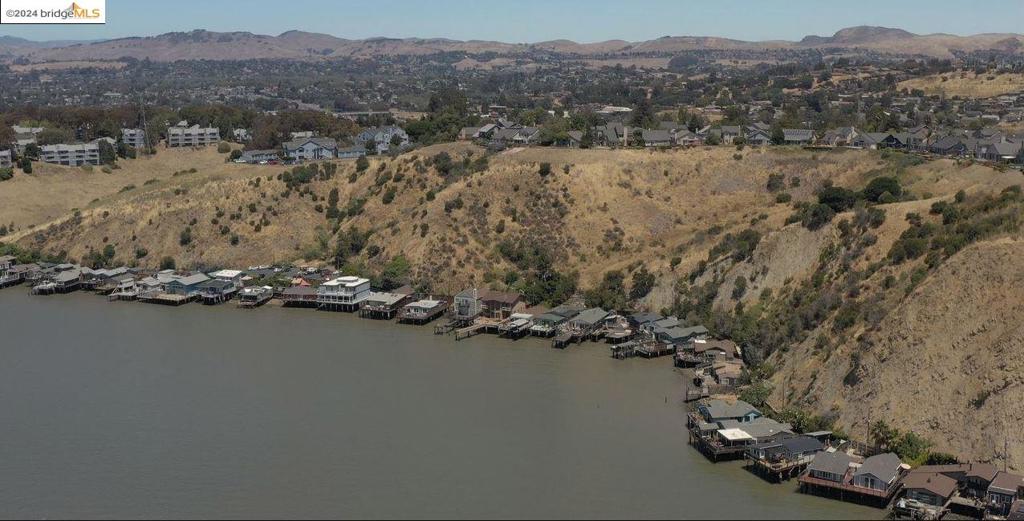 OPPORTUNITY ZONE! Total ~9.34 ACRES stunning and expansive bay area water view parcel. The general area of this parcel is recently mentioned in Vallejo's General Plan 2040 which envisions a continuous pathway along the waterfront. The Vallejo-San Francisco Ferry Route runs multiple times daily directly in front of this beautiful area. Parcel has easy access to Interstate 80 freeway near Cal Maritime and Carquinez Bridge. The parcel is zoned as low density raw residential subdivision land. Any plans submitted need to have 5000sf lot size minimum and must be cleared by City and other relevant agencies. Utilities are thought to be available within or adjacent to property (electric, sewer, water). Refer to parcel C of Solano County Parcel Map Book 18 page 7 and Solano County APN 0062-010-390. Parcel is in LMD for maintenance by City. Seller will provide additional information to qualified buyers. See Notes. No trespassing on to parcel please. Views: Carquinez
