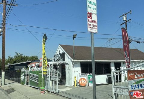 Photo of 7712 Seville Avenue, Huntington Park, CA 90255 (MLS # 26664805)