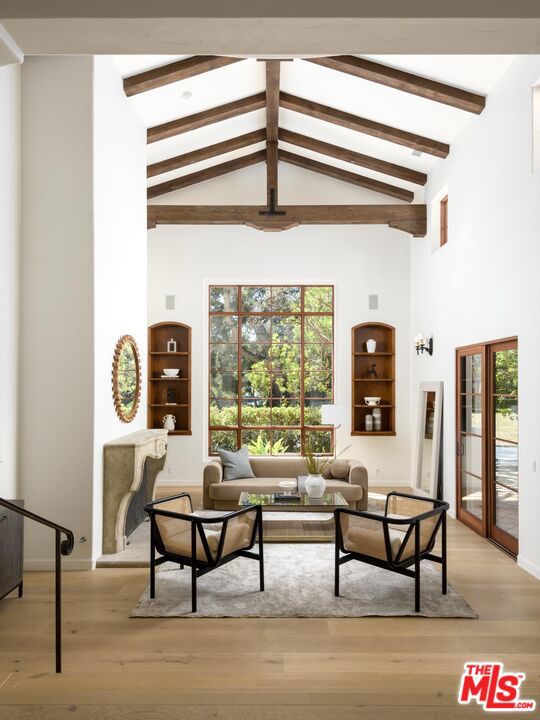 Behind Montecito Valley Ranch's private gates, this home offers a Mediterranean sanctuary of timeless elegance and refined craftsmanship. Set on 1.68 oak-strewn acres with mountain views, this 4BD/5.5BA estate blends soaring ceilings, hardwood floors, and antique wrought iron details. Perfect for indoor-outdoor living, the gourmet kitchen opens to a grand family room and outdoor loggia with fireplace. The luxe primary suite features a natural stone bath, corner fireplace, and oversized walk-in closet. With fresh updates, lush lawns, and meandering trails, this home is a poetic escape where California beauty meets enduring sophistication.Inside, the home is a symphony of space and light. Soaring ceilings and hardwood floors set the stage for gatherings by one of four fireplaces. Each guest room offers en-suite elegance, while a versatile den provides space for creativity or repose.Designed for indoor-outdoor living, the estate offers a graceful blend of manicured lawn, lush gardens, trails leading to a wooded deck, and the occasional call of distant birdsong. With freshly painted interiors and exteriors, and refined upgrades throughout, every detail speaks to a life well-lived or one waiting to be discovered.