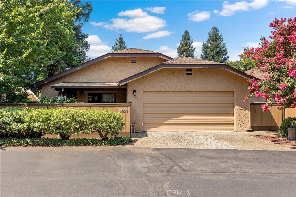 Discover this charming single-level home nestled in the peaceful Woodcrest community. This delightful 2-bedroom, 2-bathroom residence also offers a versatile den that could easily become a third bedroom by adding a closet.
The spacious living room, featuring laminate flooring and a cozy fireplace, opens to your own private patio through a glass slider—perfect for quiet mornings or evening relaxation. The kitchen is a true highlight with its newer gas range, stainless steel fridge, dishwasher, and microwave, complemented by tiled floors and granite countertops. Enjoy casual meals in the kitchen eating nook, with a glass slider leading to the front patio. Throughout the home, solar tubes ensure bright, natural light without needing to turn on the lights.
The primary suite is a serene retreat, boasting a spacious bedroom with crown molding, built-in drawers, and cabinetry for ample storage. You'll find two closets with mirrored wardrobe doors. The ensuite bath has laminate flooring, a dual sink vanity, a beautifully tiled shower with an upgraded shower head and glass doors, and a private water closet. The additional bedroom is also enhanced with mirrored wardrobe doors.
A full bath off the hallway has been tastefully updated with a newer vanity, mirror, and light fixture, accented by charming wainscoting and crown molding. Indoor washer and dryer are included, as is a whole house fan for comfortable living.
Beyond the home, enjoy the community pool on hot summer days and let the HOA handle the details—including exterior maintenance, structure insurance, water, sewer, fencing, landscaping, and pool upkeep. Discover your carefree haven in this beautifully maintained home, offering privacy, comfort, and low-maintenance living—the perfect place to call your own.