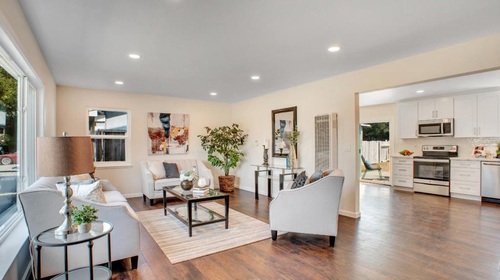 Gorgeous 3 bed/1.5 bath beauty for sale - 1,409sq on a 4,994sq lot. Built in 1964, this home has been completely remodeled with designer light fixtures throughout. All the "heavy lifting" remodel work has been done for you. Check out the inviting family room! Many new updates and upgrades including a new roof, interior and exterior professionally painted, kitchen cabinetry w/ quartz counter tops, stainless steel stove and dishwasher, tile back splash, remodeled bathrooms including vanity, mirror and toilet (full and half baths), 2 wall heaters and thermostats, shower & trim kit, gorgeous laminate plank flooring and stairs, baseboard & hardware throughout, updated landscaping, dual-pane windows and slider, front entrance doo& most interior doors, carpet in all three bedrooms, LED lighting & updated electrical (as needed), hot water heater. Garage offers dual doors for vehicle access to rear yard. Large yard is perfect for pets or future back yard oasis. Home inspection available.