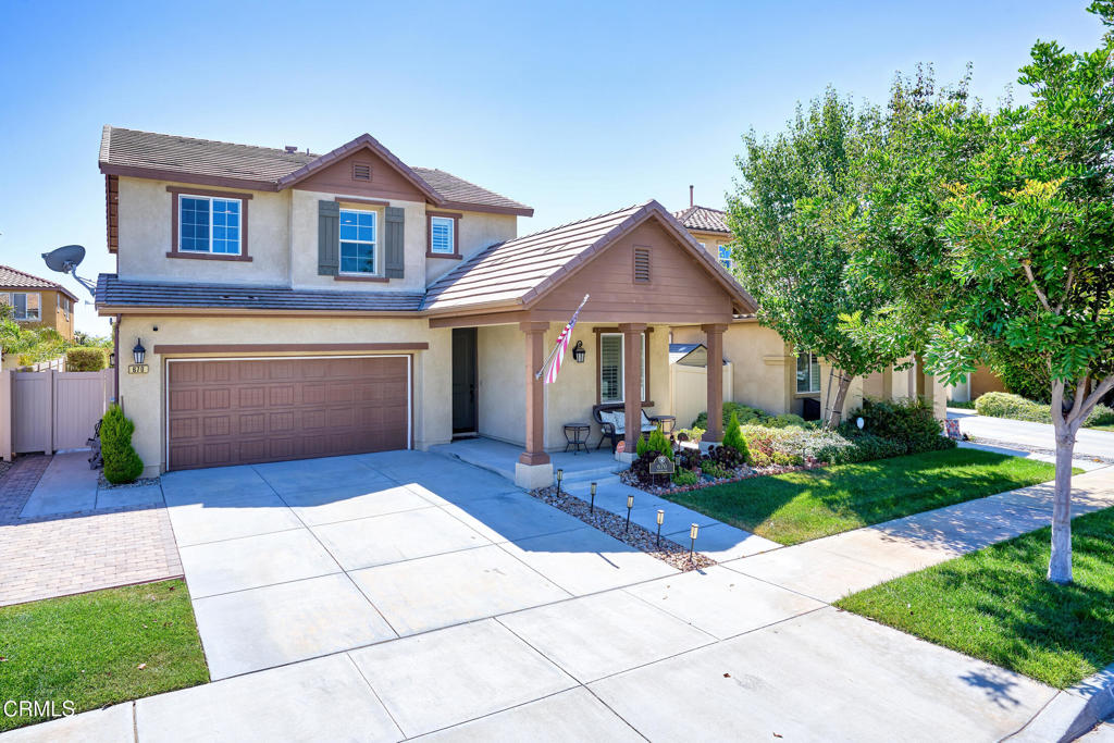 Welcome to this beautifully upgraded home, ideally situated in the prestigious master-planned community of Riverpark in The Collection. Designed with both sophistication and comfort in mind, this highly sought after residence offers 4 bedrooms plus a versatile loft that can serve as a 5th bedroom, private office, home gym, den, or additional living space, along with the convenience of a downstairs bedroom and bathroom - perfect for guests or multi-generational living. This home is truly turnkey. All it need is your finishing touch. The Seller is offering a $4500 credit to the Buyer, which can be applied toward flooring of their choice that reflects their personal style giving the Buyer an opportunity to customize this home and make it their very own or apply toward closing costs.This open-concept layout features a warm and inviting gourmet kitchen, complete with granite countertops and tasteful backsplash, stainless appliances, ample cabinetry and a walk-in pantry. A spacious kitchen island with breakfast bar provides additional seating opening directly to the expansive great room and adjacent eat-in dining area creating the perfect space for entertaining or everyday living.Upstairs, the primary suite provides a serene retreat, featuring a generous walk-in closet, dual vanities, a soaking tub for relaxation and a separate shower. The upstairs layout also includes a laundry room for added convenience and a versatile loft space.Thoughtful details enhance this beautiful home throughout, including upgraded recessed lighting and dimmers, crown molding, plantation shutters, custom blinds, and new freshly painted interior in custom neutral tones. Practical upgrades include central air, a tankless water heater, whole-home water softener and reverse osmosis and a 2-car garage. Step outside to a backyard great for entertaining with a covered patio that has ambient lighting, two gas lines that can be used for your BBQ and firepit and professionally landscaped grounds with automatic sprinklers-ideal for relaxing or hosting friends.Ideally located near parks, scenic walking and biking trails, tennis and basketball courts, schools, playgrounds and a dog park, all just steps from home. Residents will enjoy the comfort and convenience of living near The Collection Shopping Center that offers: restaurants, shopping, a movie theater and even a bowling alley as well as easy freeway access and close to coastal beaches.