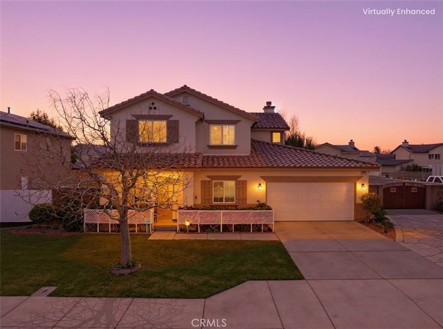 Welcome to this stunning 5-bedroom, 3-bath home offering 2,373 sq. ft. of elegant living space on a spacious 9,304 sq. ft. lot—an entertainer’s dream! Enjoy a bright formal living and dining area with stylish laminate flooring throughout. The gourmet kitchen features a large island and opens to a cozy family room with a fireplace. A main-floor bedroom, full bath, and laundry room add convenience. Energy-efficient leased solar panels help lower utility costs. Step outside to your private resort-style backyard with custom stamped concrete, a sparkling pool, pool house with a full bath, and RV access. A 3-car garage and extended driveway provide ample parking. Close to parks, shopping, and freeway access—this home truly has it all! Don’t miss the chance to own this incredible property—schedule your private tour today!