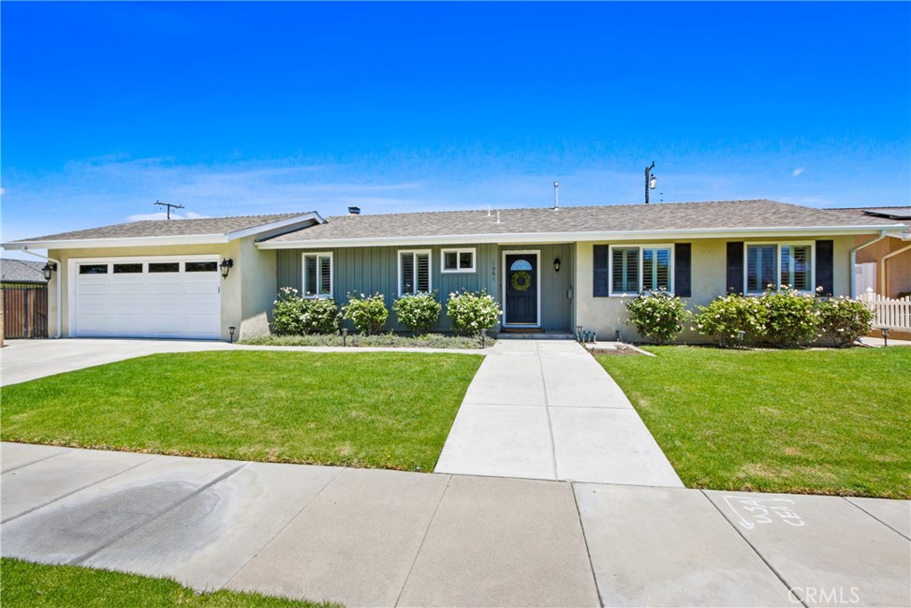 Beautifully upgraded 4-bed, 2-bath single-story home in a quiet Orange neighborhood within the top-rated Villa Park High School district. Open floor plan with custom built-ins, cozy fireplace, and sliding doors to a spacious backyard with 2 pergolas, play area, and lush lawn—perfect for entertaining. Remodeled kitchen features shaker cabinets, quartz countertops, stainless steel appliances, farmhouse sink, and walk-in pantry. Both bathrooms have been tastefully remodeled with modern finishes. Primary suite includes updated en-suite bath. Additional highlights: wide-plank flooring, recessed lighting, dual-pane windows, central A/C, and indoor laundry room. Close to parks, dining, shopping, and top-rated schools: Handy Elem, Cerro Villa Middle, and Villa Park High. Turnkey and move-in ready!