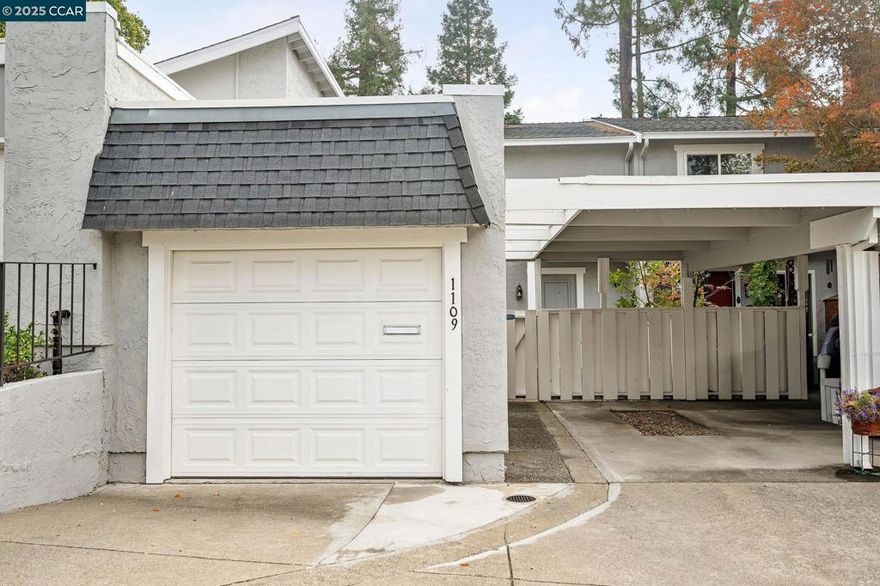 This lovely townhome, meticulously maintained and owned by the same family since 1992, is located in the highly desirable Rudgear Estates neighborhood. The moment you walk through the front door, you'll love the expansive living room -- which includes a versatile nook perfect for your favorite desk/table setup. The well-designed kitchen boasts custom cabinetry, complete with pull-out shelves that serve as a de facto pantry ... and the connected dining area flows seamlessly out to a peaceful backyard patio, ideal for outdoor entertaining and relaxation. The large primary bedroom features a vast walk-in closet, and the massive second bedroom provides invaluable flexibility. Additional highlights include a deep one-car garage with ample storage space, along with a long carport and driveway that can accommodate multiple vehicles. Truly a wonderful place to call home in a sought-after community!