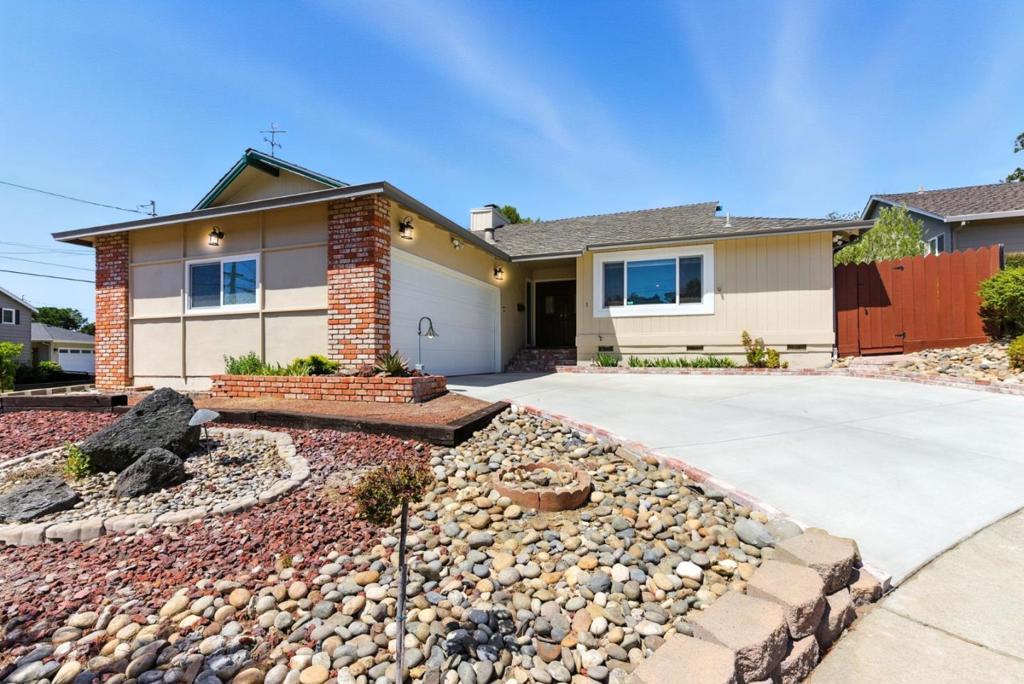 Welcome to this charming, single-story rancher within the desirable Haskins Estates neighborhood of Belmont. This 3 bed, 2 bath home boosts 1,460 sqft of living space on a large 6,750 sqft corner lot in a quiet cul-de-sac location. The home features hardwood floors, recessed lighting, central heating, double-pane windows, granite counter tops in the kitchen, an ensuite primary bedroom, and a wood burning fireplace in the living room. The backyard features beautiful pavers, lovely landscaping with plenty of fruit trees, and a great space to entertaining. Enjoy the attached two-car garage that has commercial sized side-by-side washer and dryer, as well as a second refrigerator. Within minutes: Top Belmont Schools, the 92, 280 and 101 Freeways, Major Tech Companies, Crystal Springs Village, Laurelwood Shopping Center and Hillsdale Shopping Center.