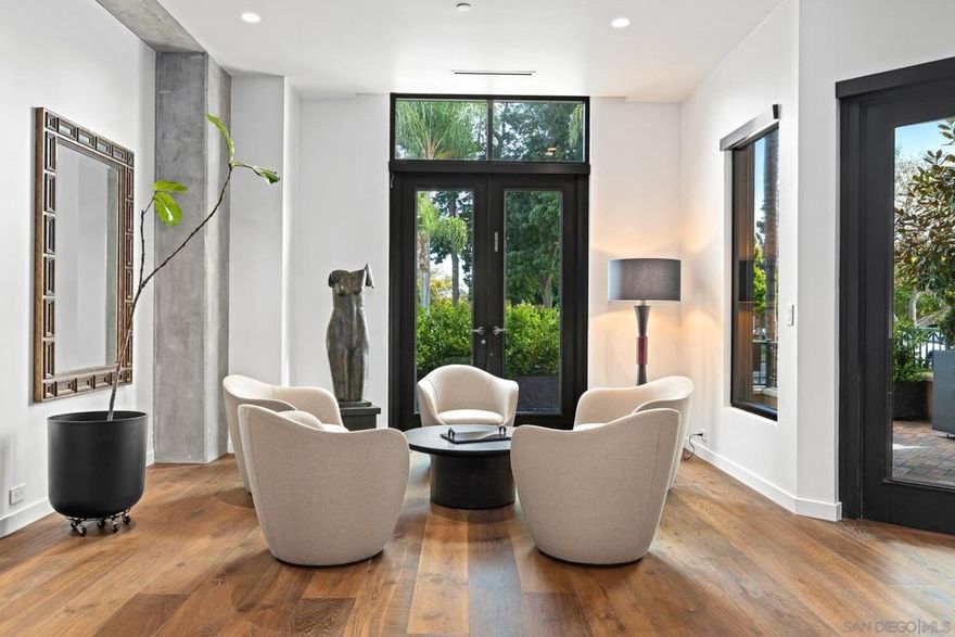 Rarely available, private townhouse at Park Laurel with direct frontage on Balboa Park. Exquisitely renovated from a complete gut rebuild in 2023/2024. Hardwood floors throughout, high end Gaggenau appliances, Visual Comfort sconces and light fixtures, state of the art pneumatic elevator, soundproofing, extra levels of Quiet Rock drywall, direct frontage on Balboa Park with private gate, private gated oversized garage, two very large storage units integrated into basement garage, custom Rutt solid wood cabinets, all Rocky Mtn bronze hardware, custom solid walnut bookshelves, motorized privacy shades, ADA compliant walk/roll in shower in main bath completely clad in Calcutta marble, double Gaggenau full height wine storage units, modern custom linear ceiling vents.  Park Laurel is located at the entrance to the world-renowned Balboa Park and many amazing restaurants are located just steps away.  Park Laurel offers many amenities for the residents to enjoy including 24/7 staffed lobby, on-site property manager, fitness center, pool & Jacuzzi, meeting area, conference room and BBQ area.  Building is pet friendly and there is a dog park just a short walk away.