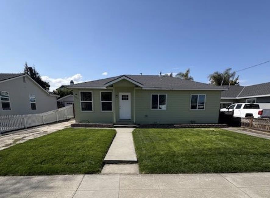 Welcome to this charming 3-bedroom, 1-bathroom home located in an established quiet tree lined neighborhood. This residence offers a comfortable 1,044 square feet of living space, perfect for those seeking a cozy yet functional layout that flows from living to dining to kitchen with ease. The kitchen is a standout feature, equipped with quartz countertops, a dishwasher, garbage disposal, microwave, and a gas oven range, complemented by a convenient pantry for additional storage needs. The interior boasts laminate flooring throughout, providing a sleek and easy-to-maintain surface. Practical amenities include an inside laundry area complete with a washer and dryer, central AC, detached garage, large yard round out this cozy and functional cottage Central Santa Clara location between Nvidia and Santa Clara University and easy access to Freeways